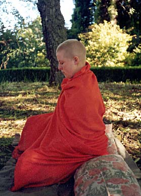 Caroline meditating in the garden at the family farm Te Kouka, 2000. 